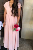 I initially ordered a medium and it was extremely big on me. I returned it and ordered a small. The small fit great. I'm not very tall so I did hem it (I did not want the dress to drag at all because it was an outdoor wedding). I wasn't blessed with a chest so the cleavage part of the dress was completely loose and open, however, it was an easy fix (I used a safety pin). The color of the dress was beautiful and it was a very comfortable dress. I was worried about ordering online. My main concern was that the fabric would feel cheap and be transparent. The dress was not transparent at all! The fabric was not very heavy. It was a great dress! I would definitely order from Lulus again. - Andria L.