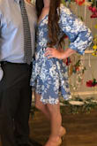 I love this dress! Easy to adjust size wise because it is a wrap. It is very low cut so I wore it with a white lace bralette and it made it look like the lace part was part of the dress. Be careful wearing it if it's windy out because it is a wrap and the bottom will try to fly open. Overall, very happy with this dress. - Rebecca G.