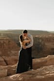 I bought this dress for my engagement pictures at Horseshoe Bend and it was perfect. I loved the color, I purchased the emerald green dress. It fit perfectly but was a little long but that is nothing new to me. The only con would be the strappy back is incredibly hard to tie back up if you undo it and I suggest having someone help you get in and out of it because I wouldn't have been able to do it alone without going insane. - Dylaney H.