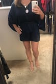 Such a classy romper!! I normally wear medium in Lulus rompers because of my chest. Fits true to size. Looks expensive and is super comfortable. Deep dark navy color is gorgeous. - Rennie J.