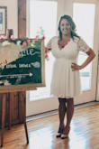 I wore this for my bridal shower and got so many compliments! The size was perfect. It does show quite a bit of cleavage and was just a tad too big on top so if you're smaller than a DD, it may need to be altered. - Caitlin W.