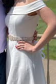 This dress was perfect for my engagement party. But I did want to share a few modifications I made, In case others may want to do the same. I sewed the top down, as it kept lifting up each time I lifted my arms. I also added a jeweled belt from amazon. I got SO MANY compliments, and I can't stop looking at the pictures of how it turned out! - Staci F.