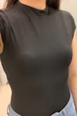 The snaps are so comfy and the material of the bodysuit really makes it unique. Great quality. This is a great basic to have in your closet. You can dress it up or down. - In F.