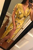 My only complaints are that the dress is a little long (even with heels) and the bust is a little big for me. I might have been better off with a small. It's a very pretty dress though and will be perfect for the beach wedding I'm wearing it too. The fabric is also a little bit thinner than I expected it to be. Choose your panties wisely. - Julia O.