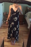 Excuse the poor quality picture. I wore this dress to a summer wedding and it was incredible. I was a little nervous with the top cutting so low on my chest but it worked out well. I probably would have gone with a Large if I didn't order last minute because it is a little tight on my chest, but overall it's a great dress. I can't wait to wear it to more events this summer because the material is so light and the pattern is so flattering! - Erin B.