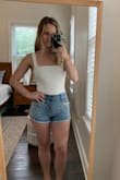 This bodysuit fits pretty great. I'm short and always have a hard time with bodysuits, but my short ladies, this is the one for us! I bought it in white and am 100% going to get it in black as well. Looks great with literally any type of bottom. And I like that it's a thong. Would highly recommend this purchase. - Shelby P.