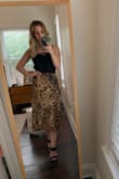 I like this material a lot and the print is very fun. It's so silky and nice. Also, I'm always a fan of leopard, but it's very in right now especially with this midi cut. The whole outfit is Lulus soooo in case you want to shop it... I paired this skirt with the Maddox Black Satin Lace Cami (a true wardrobe staple) and Medina Black Suede High Heel Sandals. Great date night outfit. - Shelby P.