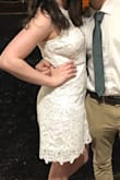 I wore this dress for graduation. It's very feminine, dressy, and figure flattering. The holes are a little revealing down the front, so I just wore a little camisole. Very happy I found this dress! - Doris B.