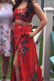 I bought this dress for an event, and it's absolutely gorgeous. Bought size small. The quality/ thickness of the material and vibrancy of the color is even better than what I expected. I received sooo many compliments on this dress and it's like nothing I've found in stores. It does run a little small but the wrap skirt with two ties and adjustable top makes it easy. Wore petals and required hemming. Awesome purchase! - Leah M.