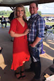 I wore this to an outdoor wedding. I run between a medium and large, depending on the style of the dress. I went with a medium on this, and it wasn't tight anywhere/fit great. The neckline went a little low for my comfort, so I did add a stitch.  But, if I'd had a nude-colored bra instead of a black bra, I probably wouldn't have worried about it as much. Love this dress and glad I made the purchase! :D - Aly K.