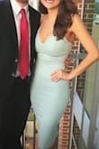 This dress was perfect! I normally wear an extra small from Lulus and ordered an extra small with this. It fit great! The fabric was thick enough that it felt good. The dress was longer then I thought it was going to be as it hit slightly below the knee, but I didn't mind this. - Nina K.