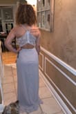 This is my bridesmaids dress for my sister's wedding in August, and it fit me perfectly. I have to get it hemmed because I am 4'10" but other than that I am really happy with the fit from top to bottom. - Mia S.