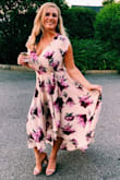 I wore this dress to a wedding and got so many compliments. I felt like a princess in it! I have a very large busy so I needed it to be altered in order my breasts to stay in place lol. Loved the dress though!! - Alicia D.