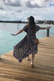 Love the stripes and cinch tie in front. Great beach or pool accessory for summer when you want to pop something on over your suit but don't want to throw on a whole outfit. Also looks way more expensive than it was - score!! - Claire S.