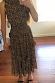 Such a lovely dress for most any occasion. There is a bit of weight to the dress, which may be something to consider if wearing for a summer event in a hot environment. Otherwise, a perfect dress that can be worn year around. - Denise D.