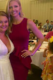 I am usually a small in Lulus brand dresses and I got a small in this and it was perfect. When I sat down, it fit nicely as well.  I liked how the extra  embellishment broke up the dress so it didn't look really tight. I was emtremely comfortable and I was able to wear a bra. There is a lining in it so it made it thicker- it didn't make me hot or anything. - Leslie S.