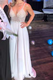 Bought this or an emceeing event. It was a hit and didn't need any alterations! - Genevieve N.