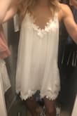 I love this dress so much! It is perfect for South Carolina Summers. It has a loose fit, I won't wear a bra with it - just pasties. It's back strap is adjustable, which is amazing. It isn't see through at all - huge win!! The flowers are gorgeous and make the dress look really expensive! - Mechelle B.
