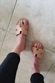 The sandals are super cute and the quality looks nice, however the leather band is huge. I'm usually an 8.5 but would go down half a size. - Julie H.