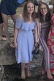 At first I thought I looked like a pilgrim but then it really grew on me. I will say that it is very low in the chest area but it didn't bother me that much. I wore this dress for my 8th grade graduation and I loved it and I got so many compliments on it. I think the pockets were my favorite part and they are truly a game changer. - Leah S.