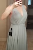 Beautiful dress, high quality and all for a great price. Read the reviews and ordered a small and it fit perfectly aside from the length which was expected. The picture does not do the color justice. Very happy with my purchase!! - Khanh D.