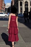 I was a little hesitant when I ordered this dress because it is not stretchy, and there weren't a lot of reviews. I was deciding between an XS and a S, because I am in-between, but I decided to go with the S. When I first tried it on I thought I ordered the wrong size because it felt loose. It turned out that the straps were too long for me. After taking in the straps, it fits like a glove! 
Also, shipping was really quick! I ordered it on Monday and it came on Wednesday morning. - Wing L.