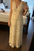 I am small chested and this just looked super awkward in that area, otherwise the dress is really pretty and tulle material with the embroidery is soft & feminine. But I returned. - Linda B.