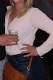 Normally I am skeptical with tight fitting shirts and high waisted jeans. But I LOVE this body suit! It's so flattering and fit perfectly! I didn't need to use a pin for the top, even with me being a DD I thought it was the perfect amount of cleavage! - Nicole W.