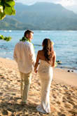 This was the PERFECT dress for my intimate HI beach wedding. After posting a few photos everyone is commenting on how beautiful it is. The dress is on the heavier side but it stays on well and is comfortable. I have a small chest so it was a little big on top but it still looked good because I wore a push-up stick on bra(no need for a bra if you have boobs). I got the front of the dress hemmed (a few inches) but left the length in the back which turned out great! I plan on wearing this dress to my reception/party but again it will be hot so probably won't last more than an hour in it (same as my wedding day). I highly recommend this dress for an elopement or intimate ceremony. - Lauren S.