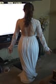 This is an amazing dress!! I can't wait to wear it for my wedding. It is a good fit for a small person but will have to get it hemmed as I am very short! But such a beautiful dress with good material! - Emma S.