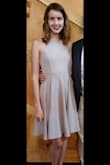 Originally ordered the S but it was way too baggy in the chest area. Sized down to an XS and it fit perfectly; still hit at my knees. Would recommend sizing down if you have a petite frame, even if you're tall like me! - Emilie N.