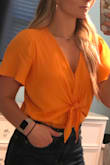 This top is SO PERFECT!! I can't even tell you how perfect it is so just trust me. The body suit is so comfy and easy to wear and is so flattering on the body. I got so many compliments when I wore this with denim jeans and some Tory Burch sandals. I have a broader back but the Small fits me perfectly and there is the perfect amount of cleavage.
Great for summer...BUY IT! SO worth the price! - Haley M.