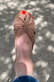 These sandals feel like slippers on your feet! I have narrow feet and size 8 is perfect on me. Love them. True to size. - Lara A.