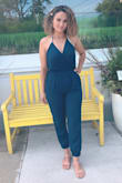 This is a very cute jumpsuit! You can wear it up or down, with high heels or sandals. I would say runs a little small but I wouldn't change it for a bigger size... almost true to size! - Paula C.