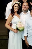 Gorgeous dress. It's a little more formal than expected due to the material on the bottom half of the dress. It runs a little large and is very long but nothing a tailor couldn't fix. Used this for a very intimate wedding ceremony with our kids. - Noell S.