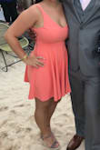 I bought this dress for a wedding in Mexico and it was perfect for the occasion! The dress was very flattering and the material was somewhat stretchy to where it fit in all the right places. It was super comfortable and lightweight for the heat and dancing all night. I was able to wear a strapless bra without it showing. It's not as orange as the picture shows, it is more of a coral color which is a color I love and was perfect for this summer wedding! - Roxanna A.