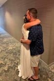 This dress was so perfect for our casual beach wedding! It was a little long (to be expected since I'm 5'2'') and a tiiiiiiny bit gappy in the bust - I didn't have it altered and I still felt beautiful and comfortable. The back was lovely - the side view in my pic doesn't give it enough credit. And the slit was high enough for me to move and breathe, but not so high as to be overly risque. Would highly rec!! - Shelby F.