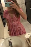 love this romper! Looked gorgeous. Only thing is that I had to order a size up out of fear of it being too short especially after washing and the top part ended up being a little big on me (small chest probs:/) but the pattern is gorgeous and I love the little cutout on the chest. Please ignore the shameless bathroom mirror pic it's the only one I took when I wore it! A must buy for summer!! - Kimberly A.