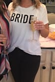 I wore this at a get together with my bridal party. I usually wear a size medium but ordered a size large because I wanted it to be a little over sized so I could do a front tuck! It is super soft and comfy! - Shea G.