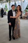 The dress fit beautifully. It's very flattering. It's perfect for a summer wedding. It did seem like it might be a little see-through. I was nervous about undergarments showing so I wore a skirt slip underneath. - Grace W.