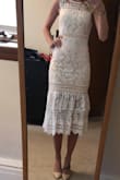 I absolutely LOVED this dress for my bridal shower. I received compliments the entire day from both guests and employees that worked at the venue. I really love that it's a longer length and can easily be worn with heels regardless of height. My only qualm is that my bottom half is much larger than my top half so because this dress was tight fitting (no stretch at all), it fit my bottom half perfectly but felt pretty loose around my rib area. But that is more of a personal issue not so much the dress design. If it were for a more formal event I might've gotten the top half altered to fit.
Because there is no stretch, I recommend sizing up or ordering multiple sizes to try on. I wore a small instead of the XS I typically get when ordering from Lulus. - Rachael S.