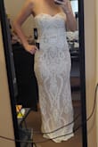 Pretty dress. I ordered too small of a size but the style is nice. I reordered in a small to see how it really looks on. - LAUREN K.