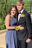 I bought this dress for my daughter's prom. She looked amazing!!! The color was gorgeous and no one else had a dress in this beautiful blue color. The back cross cross straps made it flirty and fun. I had it hemmed to fit with a cute pair of yellow shoes. She really looked cute and said it was super comfortable and light to wear. Best dress ever! - Valerie E.