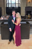 This dress fit perfectly. The high/low is key to showing off great shoes and makes it easy to walk. The top fit perfect since it is adjustable. Beautiful details in the back. My boyfriend loved it. - Brittany D.