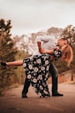 I wore this dress for engagement photos and I couldn't be happier with how they turned out, the dress had a perfect flow to it and it tied at the waist so it was very flattering and slimming as well. 
The bust was a little small so I had to safety pin it, but I have a larger bust and smaller waist so I was torn between the small and medium but if I had to do all over I would still get the small.
Looks elegant and classy and was light weight and comfortable! - Kelleigh B.