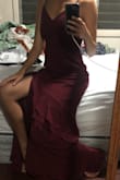 Beautiful dress. Deep color. 
Loose around the waist + little long, but definitely worth tailoring. Can't wait to use it for my best friend's wedding in November! - Serena C.