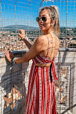 What a great red dress! I love the fabric and the details. The slits in the front of the dress & the open/tie back gives it such a unique flare! This dress runs true to size so perfect for online shopping! I would definitely recommend it for this summer! - Emily R.