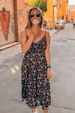 I love this dress! The floral design is beautiful and looks great. It fits true to size, and I ordered a medium. I was a little worried as I have a small waist and wider hips, but it looks fabulous!! - Emily R.