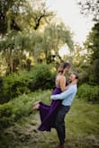 I wore this dress for my engagement pics. Looking back, I would have ordered a Small (straps are adjustable and runs a bit large). It's also very flowy in the mid section, so Small would have worked. It does make my boobs look super small in this dress (I even had a strapless bra)! The material is well worth the cost of the dress.
Oh and also- pain in the butt to put on (the straps get confusing, and getting my finance to put this on was also a pain lol). There would be no way to get this on solo, definitely would need some help. I think I would have worn something else that was easier to put on/take off in my opinion! - Arti P.