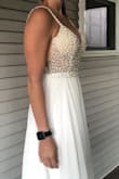 I unfortunately returned this item. It was beautiful from the front but from the side the boob cups were way too visible for my liking. - Brooke D.
